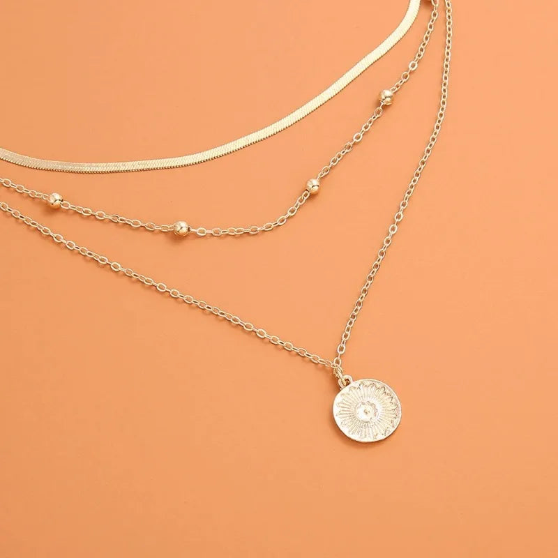 Conjunto medallón romano