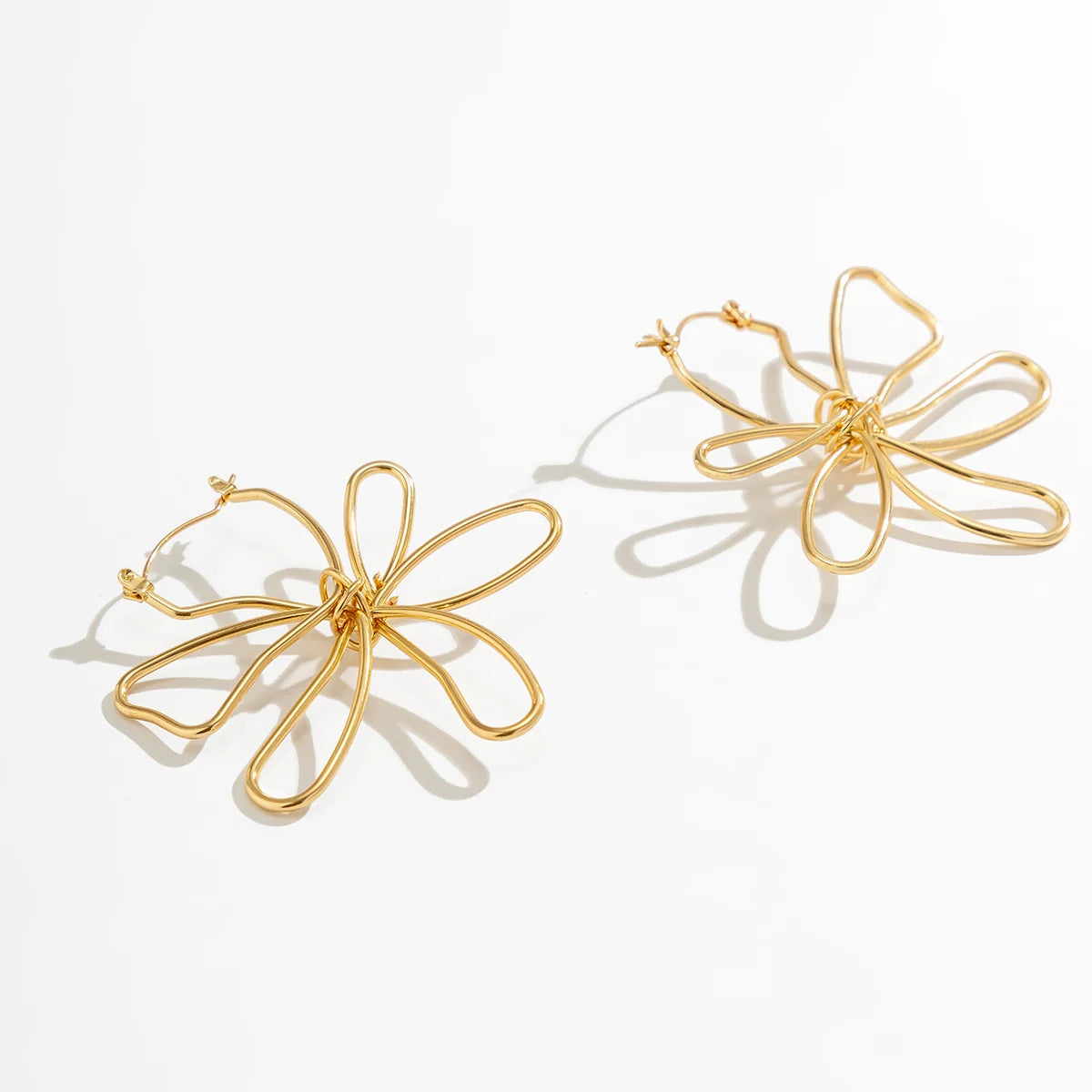 Pendiente flor Woven