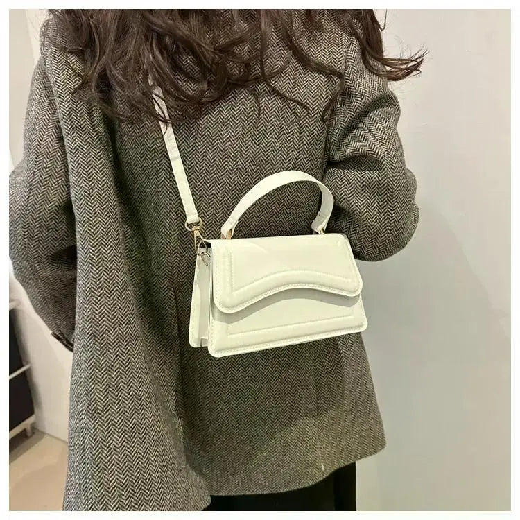 Bolso de mano efecto cuero