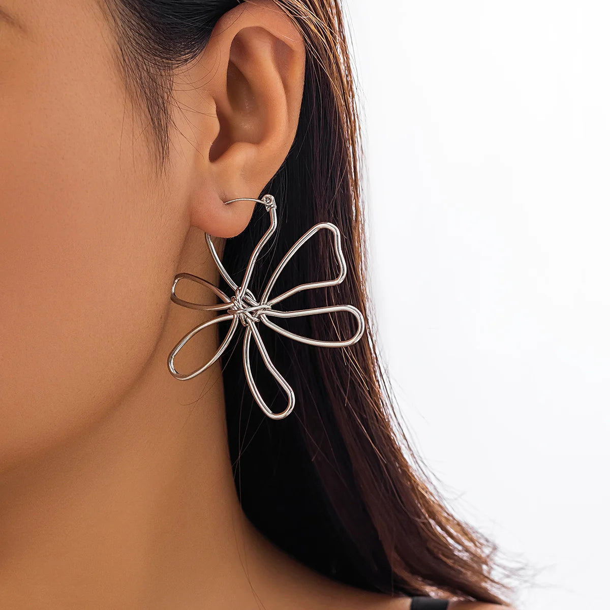 Pendiente flor Woven