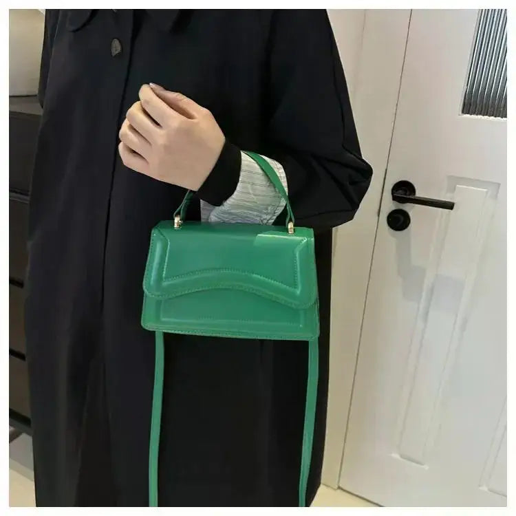 Bolso de mano efecto cuero