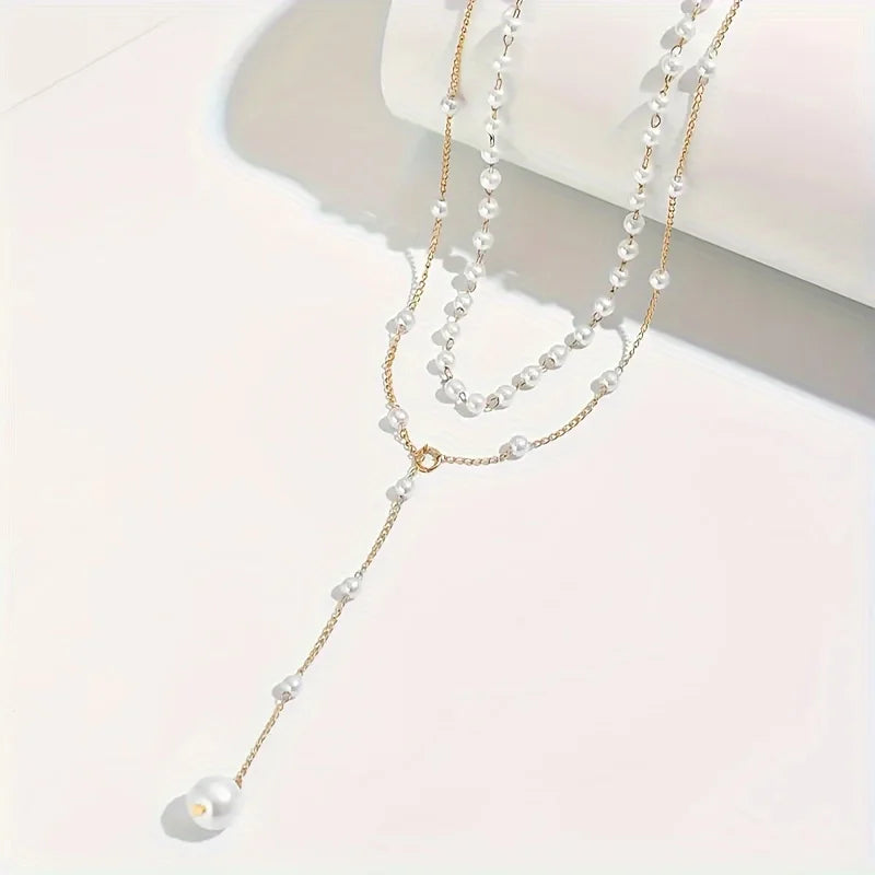 Colgante perlas