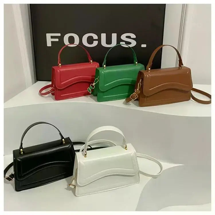 Bolso de mano efecto cuero