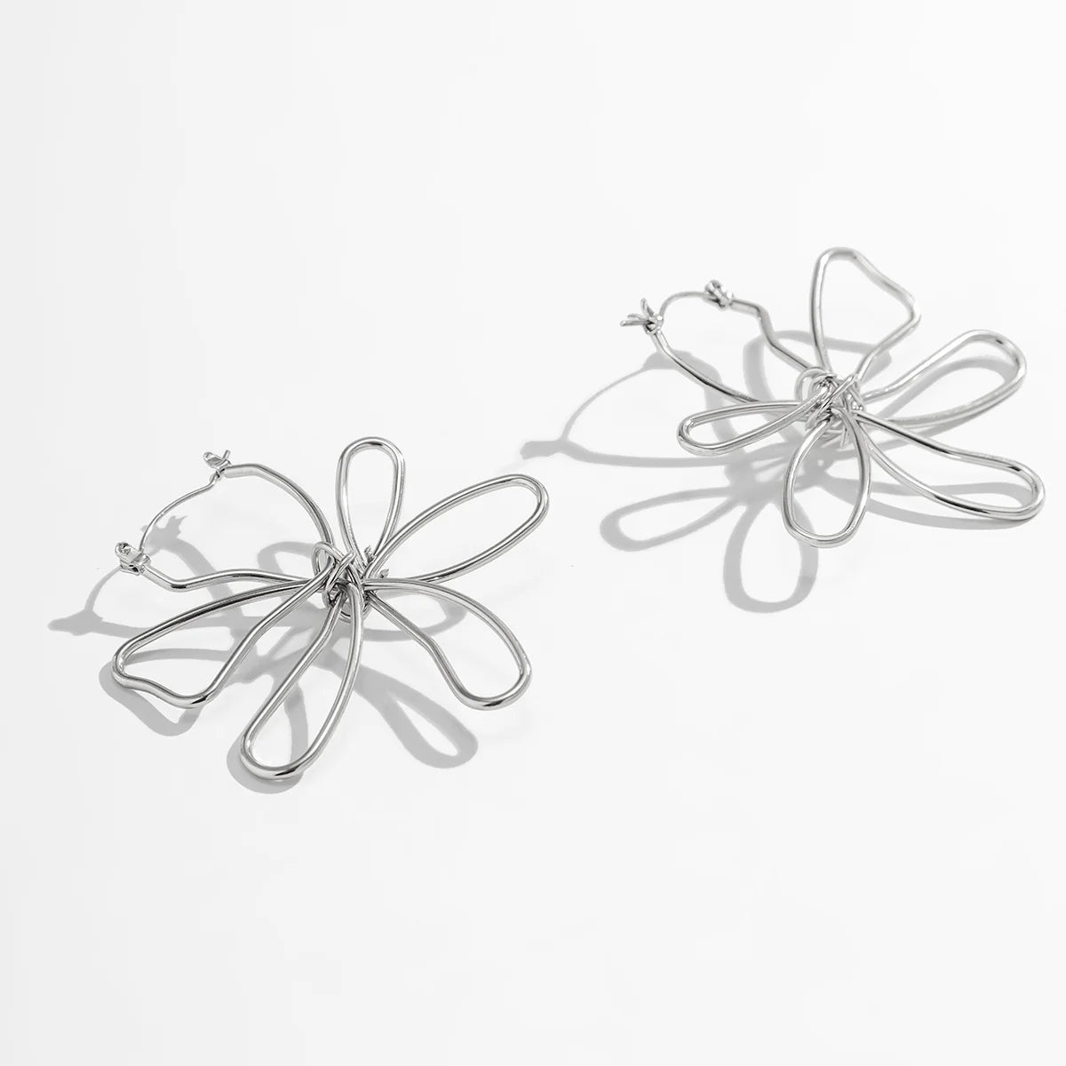 Pendiente flor Woven