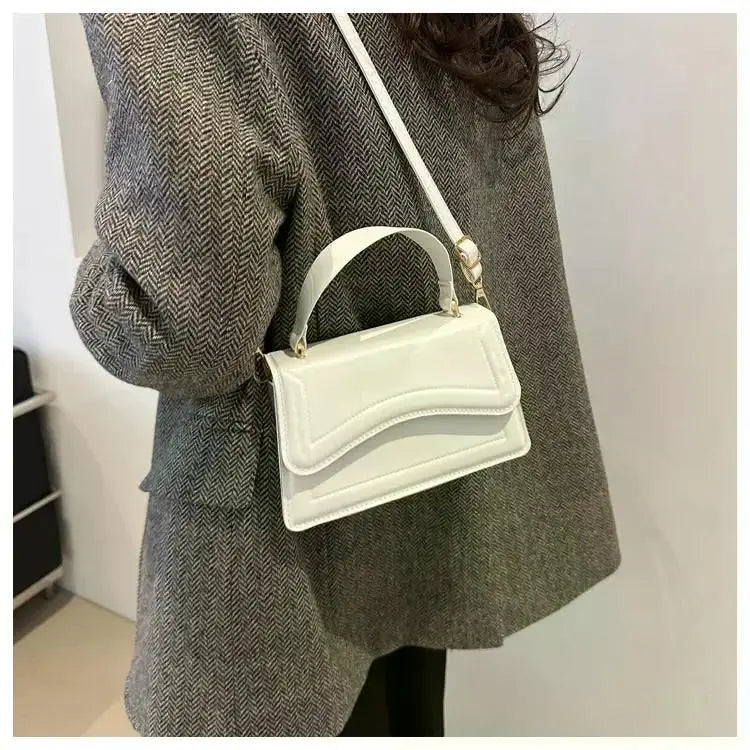 Bolso de mano efecto cuero