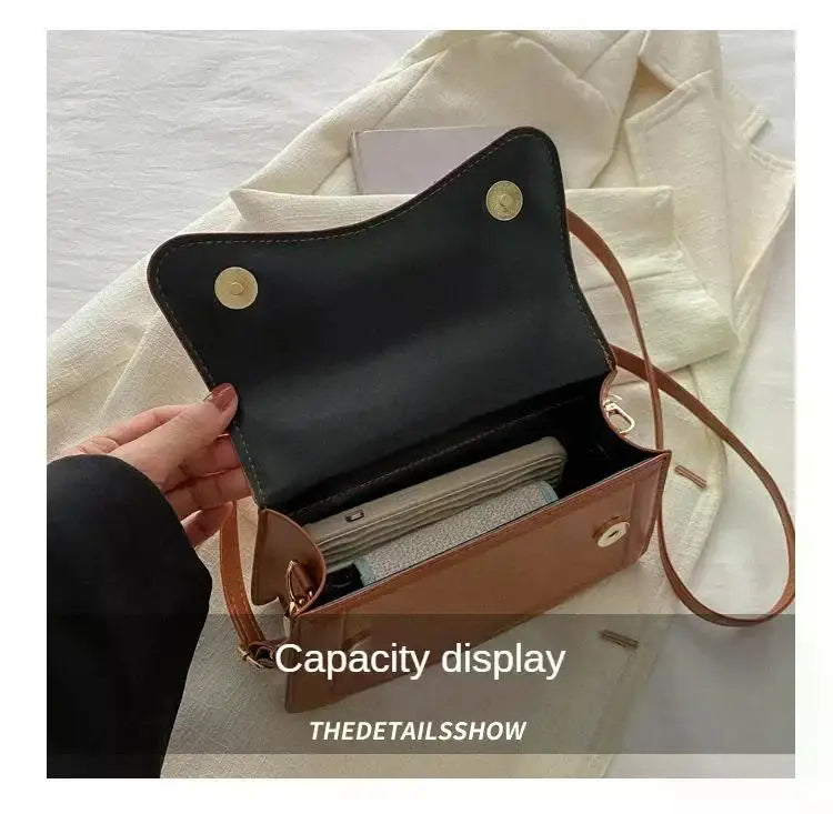 Bolso de mano efecto cuero