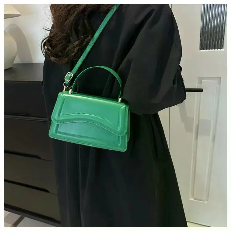 Bolso de mano efecto cuero