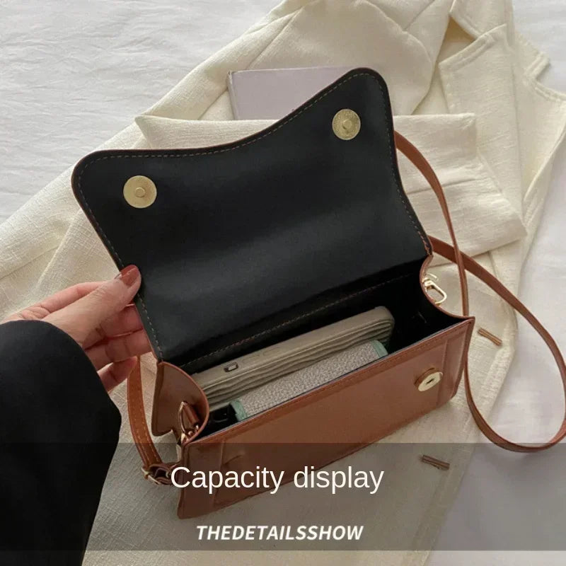 Bolso de mano efecto cuero