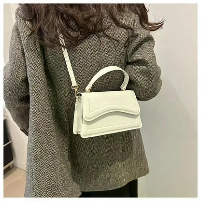 Bolso de mano efecto cuero