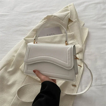 Bolso de mano efecto cuero