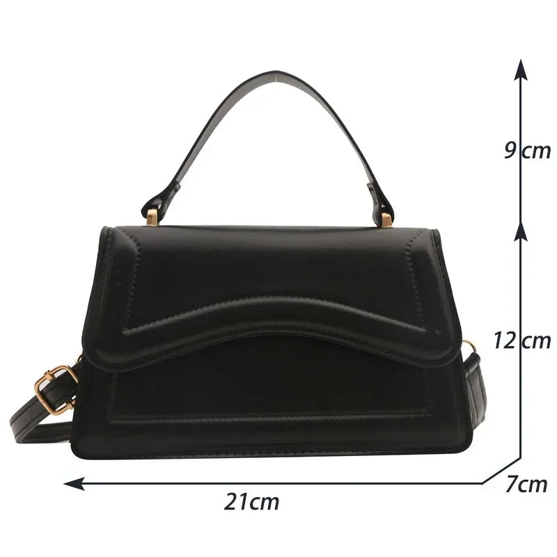 Bolso de mano efecto cuero