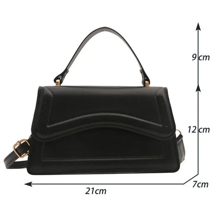Bolso de mano efecto cuero