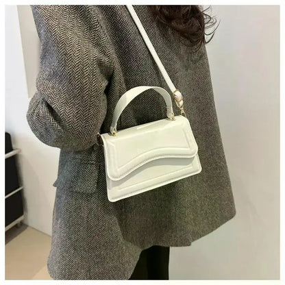 Bolso de mano efecto cuero