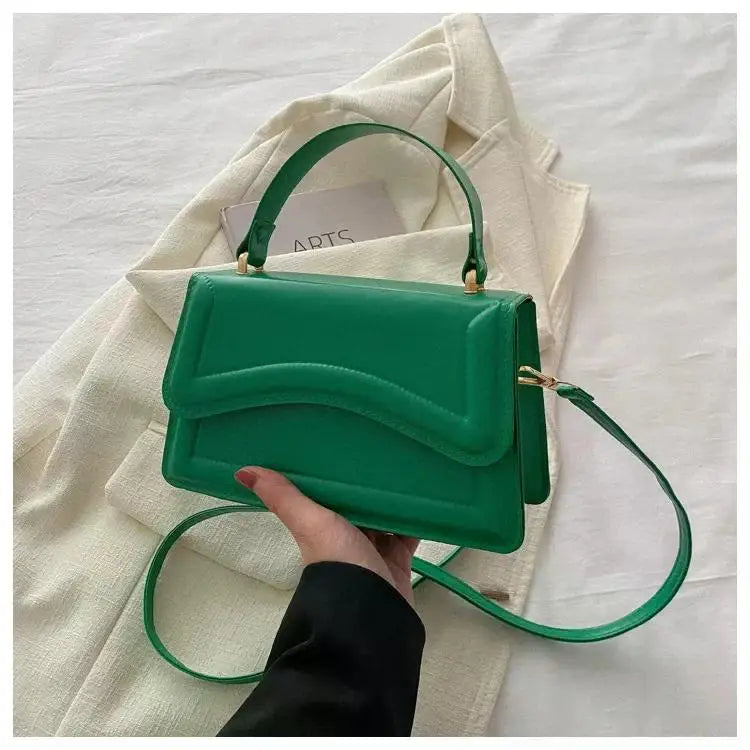 Bolso de mano efecto cuero