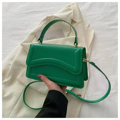 Bolso de mano efecto cuero