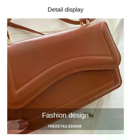 Bolso de mano efecto cuero